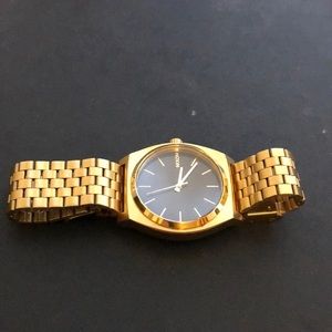 gold nixon watch